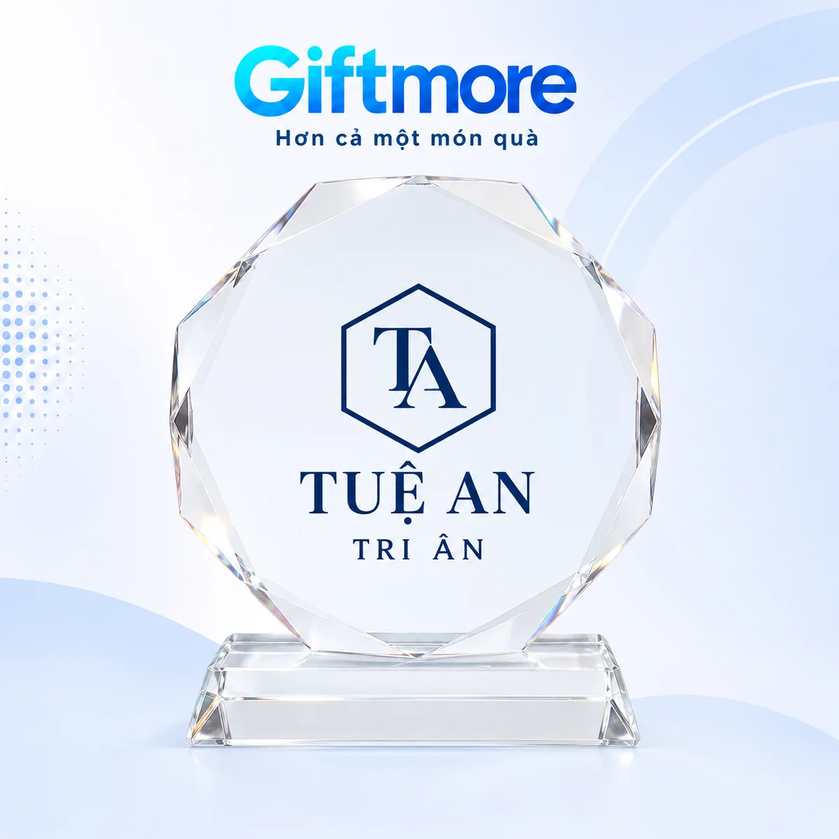 Demo monogram TA trong lục giác và chữ TUỆ AN TRI ÂN màu navy trên mặt biểu trưng bát giác