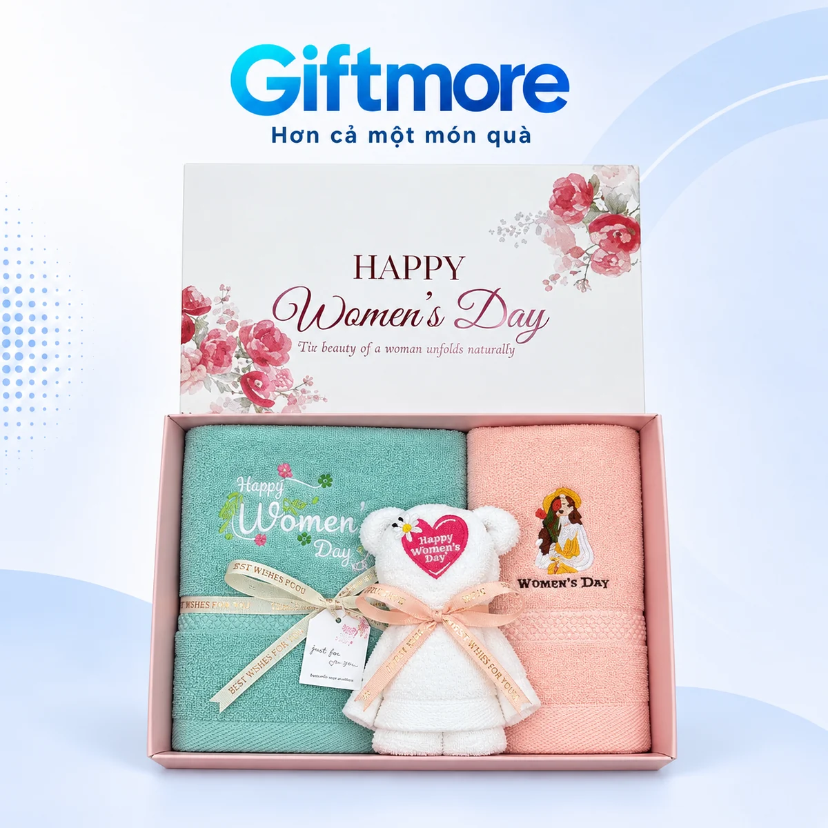 Bộ ba khăn xanh hồng và khăn trắng gấp hình gấu trong hộp hoa ngày Phụ nữ trên nền GiftMore