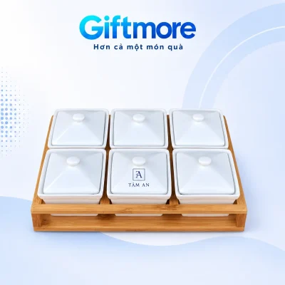 Demo TA và TÂM AN nhỏ trên nắp hũ trắng ở giữa hàng trước