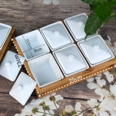 Ảnh nguồn ghi hũ mứt 10,5×9cm và khay gỗ 29×23cm với hai hũ mở