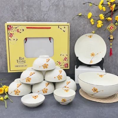 Bộ bát đĩa men kem hoa vàng 10 món in logo – đối chiếu hộp carton cửa sổ quai xách
