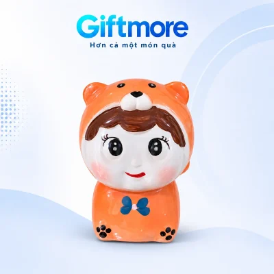 Mô phỏng heo đất búp bê áo cam nơ xanh trên nền GiftMore