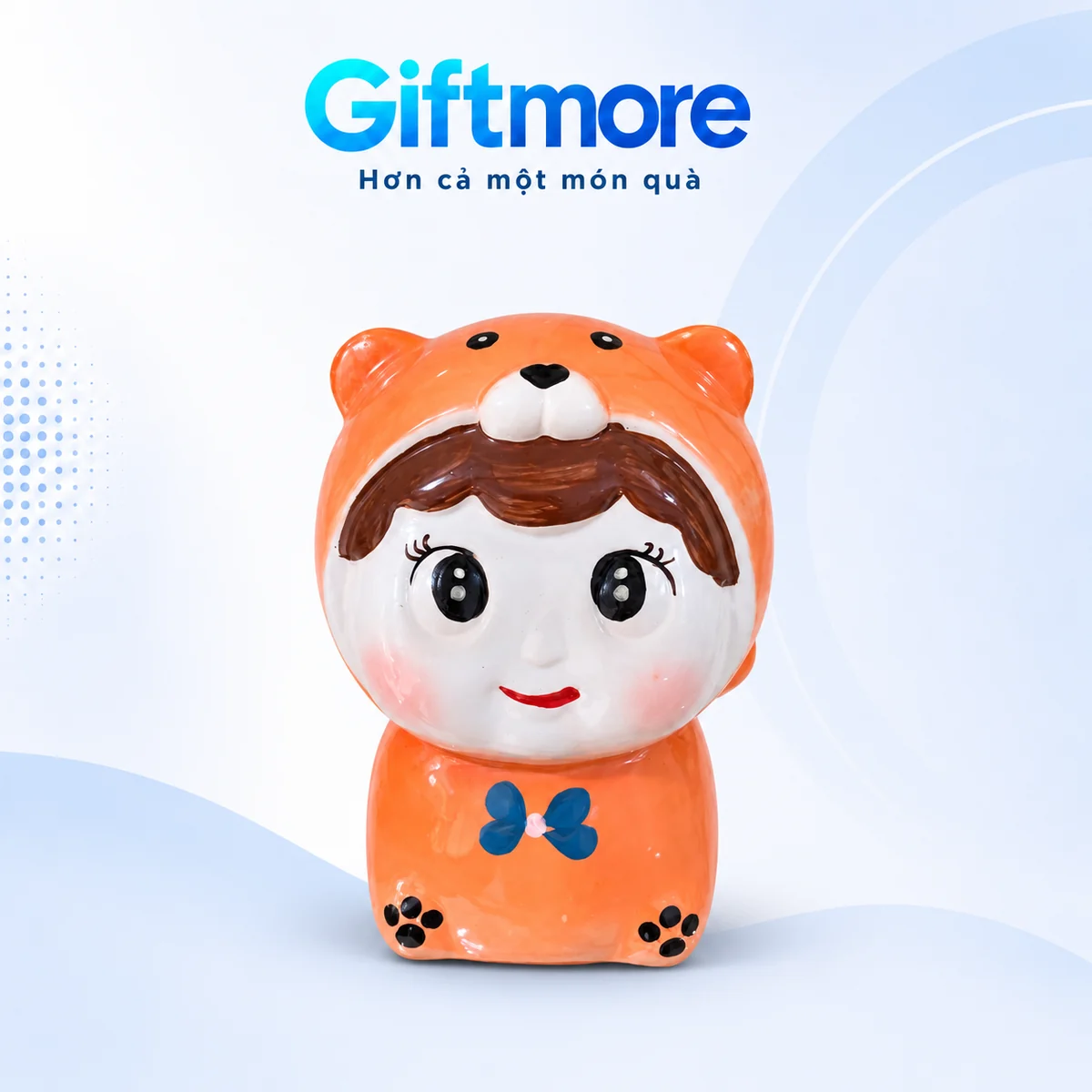 Mô phỏng heo đất búp bê áo cam nơ xanh trên nền GiftMore