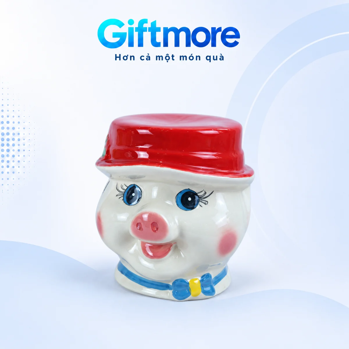 Mô phỏng một heo đất đội mũ đỏ cổ nơ xanh trên nền GiftMore