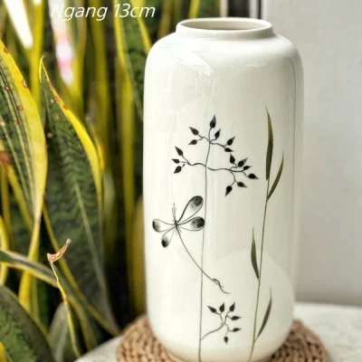Ảnh nguồn lọ ống trắng có chú thích cao 31 cm và ngang 13 cm