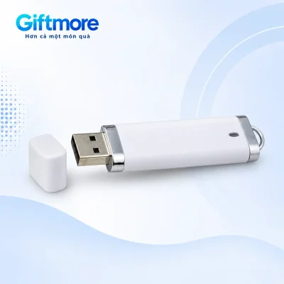 USB nhựa trắng UNV 001 mở nắp với đầu Type-A, viền kim loại và vòng nhỏ phía sau trên nền GiftMore